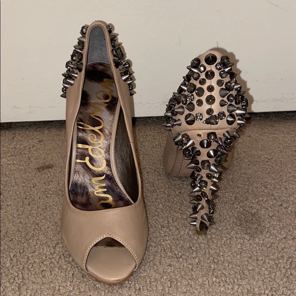 Nude spiked heels